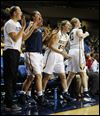 UT women win, Rocket men lose