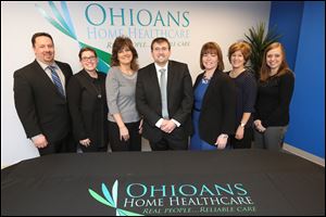 James Pierce, quality assurance manager, left; Christa Adams, human resources director; Jennifer Wood, customer experience coordinator; Josh Adams, CEO; Jen Williams, director of marketing; Shelly Williams, clinical quality assurance manager, and Kimberly Schmeltz, operations manager, operate Ohioans Home Healthcare. The Toledo-based company also has offices in Sandusky, Bryan, Lambertville, and Dayton.