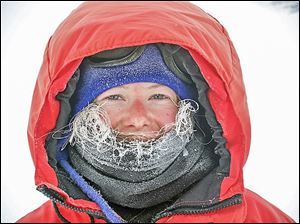 Jenna Reindel accumulates some frost in her hair while the team was spending two hours packing up their field camp in the Transantarctic Mountains.