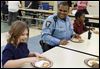 Officers share meal with kids