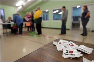 A line forms to check in for voting at Friendship Park Community Center in March. The Ohio Media Project, which includes The Blade, is kicking off a project called Your Vote Ohio.