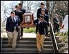Students lay to rest those who died alone