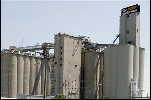 The Andersons grain silo is situated in Maumee. Weak corn harvests dragged on its grain division last year.