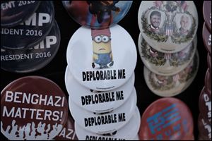 Buttons supporting GOP presidential candidate Donald Trump are for sale at the Stranahan Theater.
