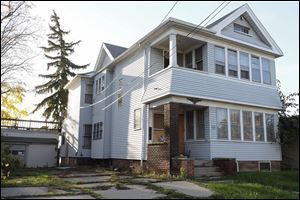 This duplex at 2557 Broadway in Toledo, which was owned by Martin Fewlas, was the home of Margaret McKnight and Kurt Mallory when they hatched their plan to forge Mr. Fewlas’ will, federal prosecutors say.