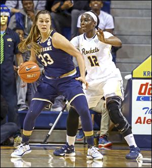 Notre Dame forward Kathryn Thompson is guarded by UT's Janice Monakana during a women's basketball game at Savage Arena in 2006. Notre Dame will return to Toledo for a game this upcoming season.