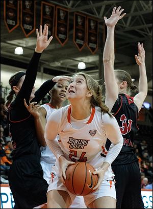 Bowling Green center Jane Uecker looks for an opening in a game last season. Uecker finished with 11 points as the Falcons lost their Mid-American Conference opener at Western Michigan.