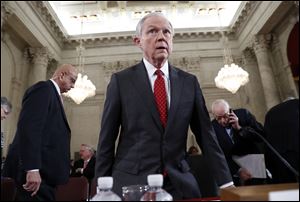 Attorney General-designate Sen. Jeff Sessions, R-Ala., takes his seat on Capitol Hill in Washington Tuesday after a break in his confirmation hearing before the Senate Judiciary Committee. 