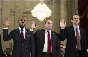 From left, NAACP President Cornell Brooks, Fraternal Order Of Police National President Chuck Canterbury, and ACLU Legal Director David Cole are sworn in on Capitol Hill in Washington prior to testifying at Attorney General-designate, Sen. Jeff Sessions, R-Ala. confirmation hearing before the Senate Judiciary Committee. 