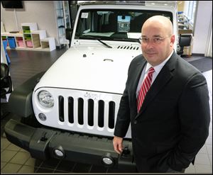 Doug Kearns began washing cars for Yark at age 17 and worked his way to vice president of the company.