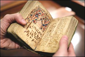 The Armenian manuscript containing the Gospels of Luke and John from 1351. It is the oldest book in the rare book collection.