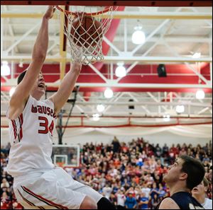 Wauseon's Austin Rotroff dunks the ball against Archbold during his team's win Friday night.