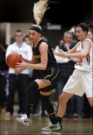 Northview's Kyley Keene grabs a rebound away from Southview's Lily Sweeney during Friday night's game.