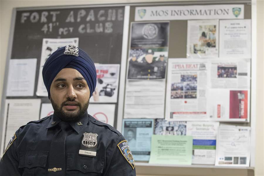 Fashion police Cops ease rules on tattoos, turbans, beards The Blade