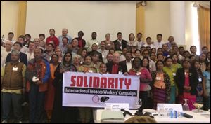  Baldemar Velasquez, center, spoke at the Agricultural Workers Trade Group conference in Myanmar this week in support of protections for tobacco workers. 