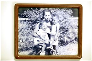 Birdel Jackson stands with his sister, Carol Ann, and his grandmother Gladys Davis Jackson in the late 1940s in front of the house built by his great-grandfather in Memphis.
