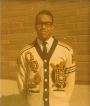 Birdel Jackson in his Omega Psi Phi fraternity cardigan on the quad at the University of Toledo in 1965.