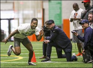 Bowling Green State University wide receiver Ronnie Moore runs a drill during a Pro Day Monday at Perry Field House.