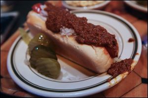 An original hot dog is served up at Tony Packo's. The local eatery plans to open a Maumee location in summer.