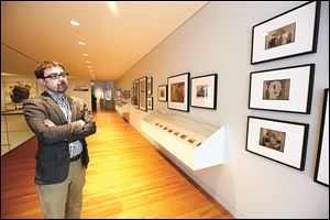 Dave Lawrence, communications manager, looks at the exhibit ‘Constructing Gender: The Origins of Michigan’s Union and League.’
