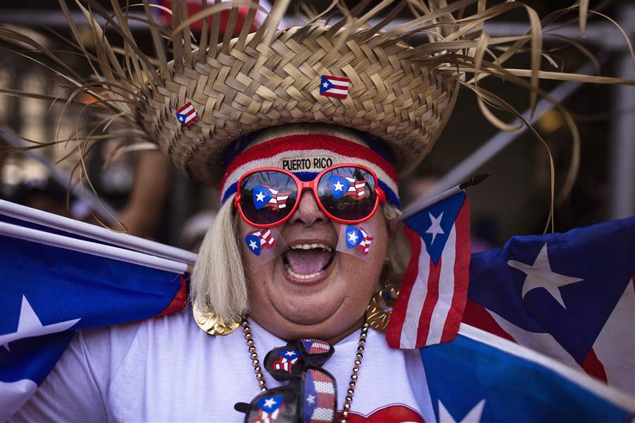 Puerto Rican nationalist booed, cheered at New York parade The Blade