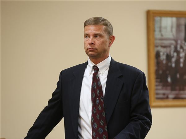 Findlay reaches settlement with former acting chief