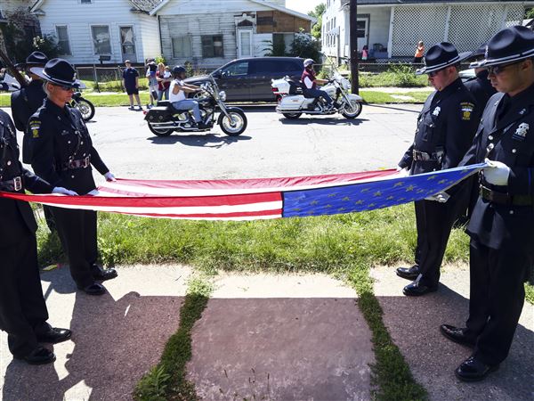 Families to close police officer scholarship fund
