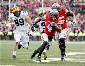 Curtis Samuel scored the game-winning touchdown in double overtime against Michigan last season. The Buckeyes have won five consecutive games against their rival.