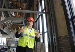 Anthony Montalto of HKS Architects speaks about the progress at the new ProMedica headquarters at the renovated Steam Plant.