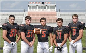 Gibsonburg football players, from left, Joey Adkins, Nate Kissell,  Brad Mendoza, Brady Jaso, and Addison Weaver are on the TAAC co-favorites