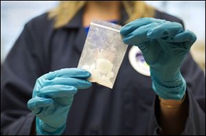 A bag of 4-fluoro isobutyryl fentanyl which was seized in a drug raid is displayed at the Drug Enforcement Administration (DEA) Special Testing and Research Laboratory. Unintentional drug overdoses killed 1,000 more people in Ohio in 2016 than the previous year, according to a report last week from the Ohio Department of Health.