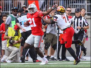 Ohio State's Parris Campbell holds off Maryland's J.C. Jackson in a win Oct. 7. Campbell did not play last week in Ohio State's loss at Iowa.