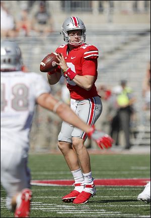 Ohio State quarterback Joe Burrow drops back to pass against UNLV last season.