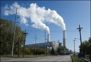 The DTE Monroe Power Plant on Oct. 13. DTE's renewable energy director says that market forces are so strongly in favor natural gas and renewable energy that it makes no economic sense for utilities to invest in coal.