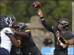 Toledo quarterback Logan Woodside threw five touchdown passes in the first meeting between UT and Akron. The teams will meet again in the MAC championship game on Saturday.