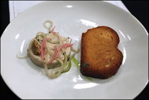 Smoked chicken rillettes with broasted brioche, dijon mustard and pickled turnip prepared by Chris Nixon at Element 112 in Sylvania, Ohio.