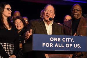 Detroit Mayor Mike Duggan speaks at the Duggan for Detroit reelection night party after winning the mayoral race against his opponent, state Sen. Coleman Young II.