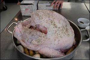 Butter helps hold spices to the skin of the turkey.