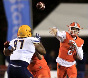 Bowling Green's Jarret Doege throws a pass against Toledo. The true freshman completed 17-of-30 passes for 270 yards and four TDs in the Falcons loss to the Rockets.