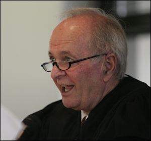 Judge Richard Knepper presides over a hearing on the sentence of Frederick Dickerson in Lucas County Common Pleas Court in 2007. Judge Knepper passed away Wednesday in his Perrysburg Township home at the age of 70. 