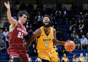 Toledo guard Tre'Shaun Fletcher drives during a game against St. Joseph's. The Rockets take a 2-0 record into Saturday evening's game against Oakland.