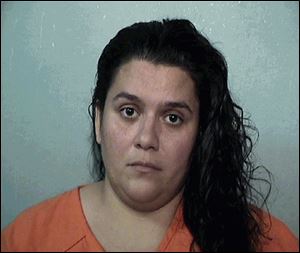 Heather Campos is charged with reporting a false hostage situation.