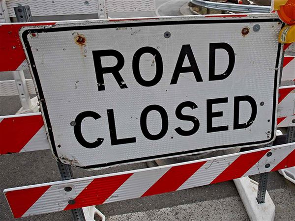 Leaf collection, crane to close city streets