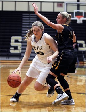 Ashlynn Brown (23), shown in a game last season, scored 14 points Friday to lead Perrysburg to a Northern Lakes League win over Napoleon.