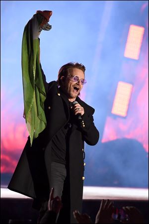 Bono of Irish rock band U2 performs in Trafalgar Square in central London.