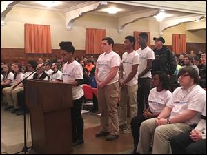 Students at Toledo Technology Academy speak about why they are in favor of raising the tobacco purchase age to 21 at a public meeting Wednesday, Dec. 13, 2017, about the issue.