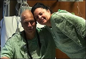 Dave Hackenberg and his daughter, Amy Walker, spend time together on Nov. 16 in a recovery room at UTMC after Mrs. Walker donated a kidney to her father.