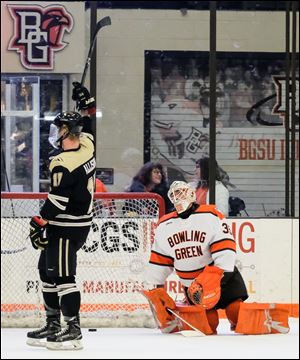 Bowling Green State University goalie Ryan Bednard (35) reacts to giving up a goal to  Western Michigan right wing Wade Allison (17) during Thursday's game.