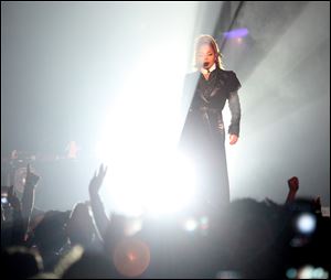 Janet Jackson enters the stage in a beam a light during her State of the World Tour at the Huntington Center in Toledo on Saturday, October 28.