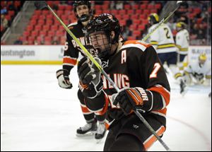 Bowling Green Falcons forward Tyler Spezia (7) celebrates his goal against the Michigan Wolverines during the first period.